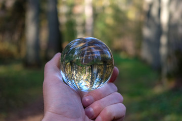 lensball in autumn reflecting nature