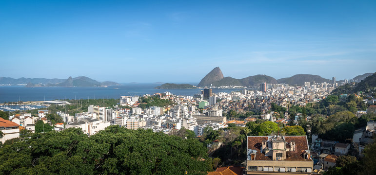 Panoramic aerial view of downtown Rio de Janeiro with Sugar Loaf mountain on background - Rio de Janeiro, Brazil
