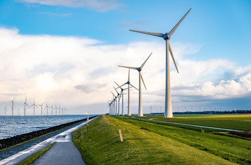 windmiil park in ocean, windmill farm rainy clouds
