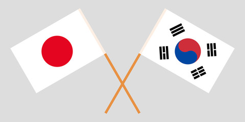 Crossed flags South Korea and Japan. Official colors. Correct proportion. Vector