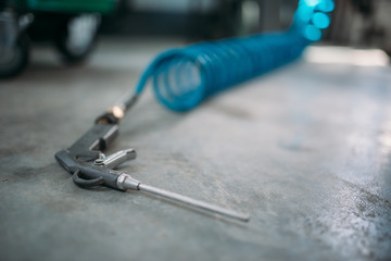 Car service air gun closeup view, nobody