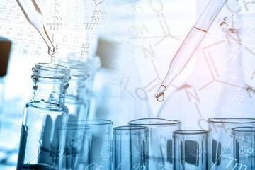 Dropping chemical liquid to test tube with lab glassware, science or chemistry research and development concept 
