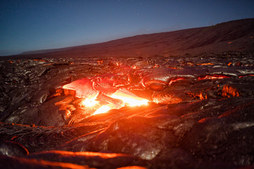 Lava flows at Volcanoes National Park in Hawaii at night