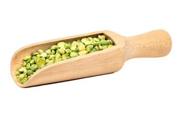 Dry green peas in scoop