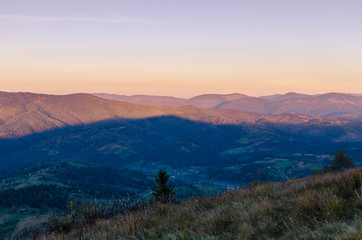 Fototapeta premium Sunset in the Carpathian Mountains in the autumn season