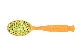 Dry green peas in spoon