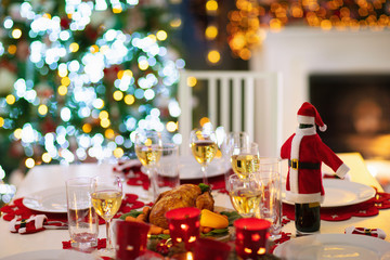 Christmas dinner at fire place and Xmas tree.