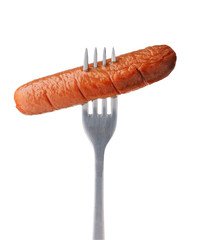 Baked sausage on a fork, isolated
