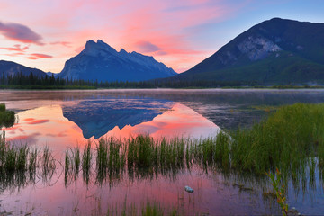 Beautiful sunrise over Vermillion Lake , Banff National Park, Alberta, Canada. Vermilion Lakes are a series of lakes located immediately west of Banff, Alberta - obrazy, fototapety, plakaty
