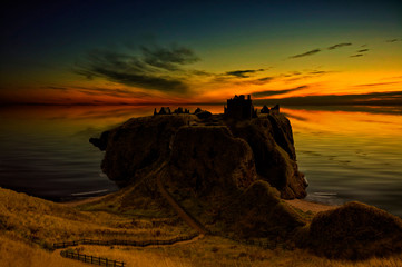 Rendered dunnottar castle in sunrise, looks like a painting