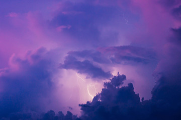 Purple rain clouds and lightening, summer time Florida