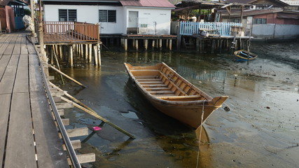 Fototapeta na wymiar Boat or in local language Sampan, a traditional wooden boat