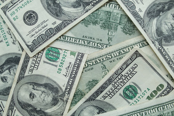 Background full of 100 us dollars. Business and finance.