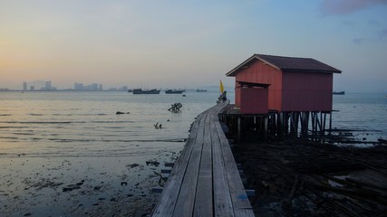 Scenic view during sunrise at Tan Clan Jetty in George Town, Penang