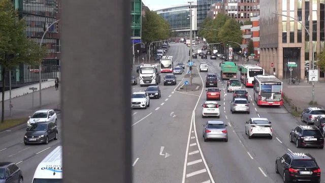 Motion time lapse: traffic on Willy-Brandt-Street (German: Willy-Brandt-Strasse) in Hamburg, Germany, view from the subway station "Roedingsmarkt"
