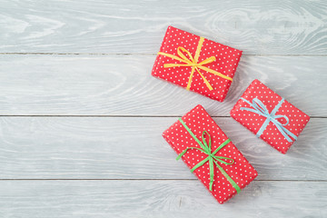 Gift boxes on wooden background.