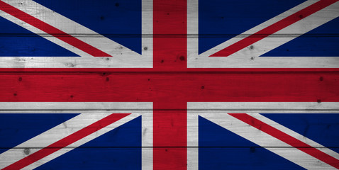 Flag of United Kingdom on wooden background, surface. Wooden wall, planks. National flag.