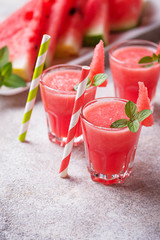 Glasses of watermelon smoothie with mint