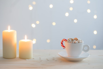 Obraz na płótnie Canvas hot chocolate with marshmallow on white background