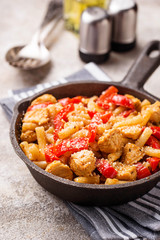 Pasta with chicken and pepper in tomato sauce