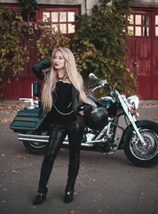 Foto op Plexiglas Beautiful woman on motorcycle outdoor.    © Alona