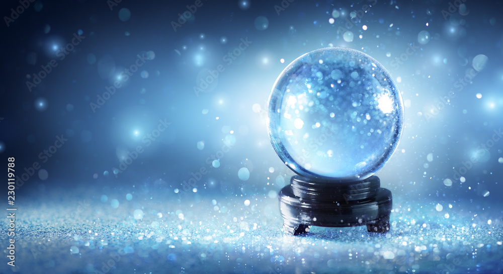 Wall mural snow globe sparkling in shiny background