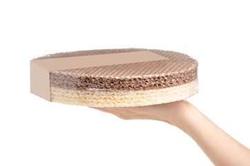 Waffle cakes sweet in hand on a white background. Isolation