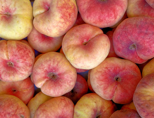 fresh juicy peaches top view closeup, fruit background