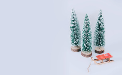 Stylish vintage wooden sled with xmas tree.