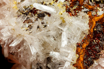 Macro mineral stone crystals Hemimorphite rock on a black background