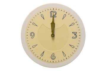 The dial and hands of the clock are showing on twelve on a white background.