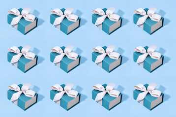 Pattern made of blue gift boxes.