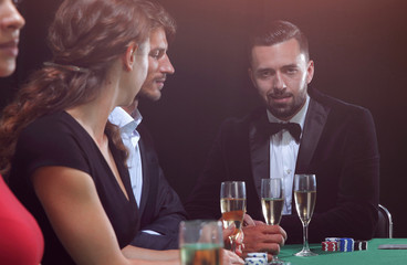 brunette girl in the casino playing poker