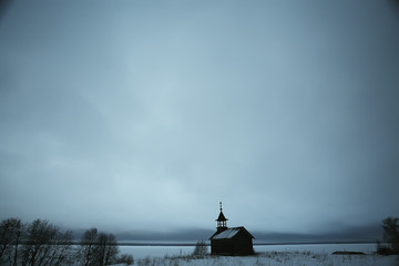 landscape in russian kizhi church winter view / winter season snowfall in landscape with church architecture