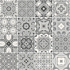 Traditional ornate portuguese decorative tiles azulejos in shades of gray