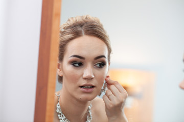the bride is preparing for the wedding