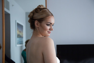 the bride is preparing for the wedding