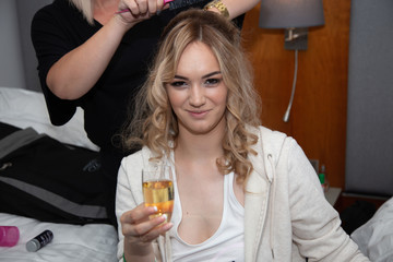 the bride is preparing for the wedding