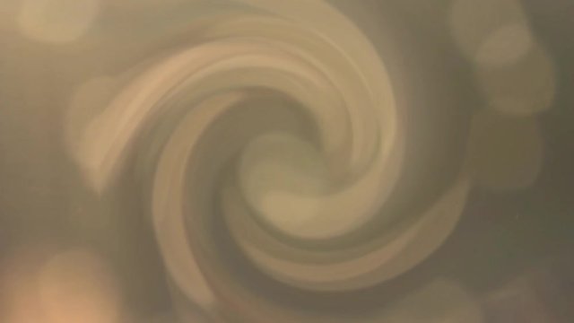 Swirling vortex of floaty bokeh balls