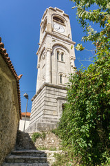 Fototapeta na wymiar Clock tower of Dimitsana village, a popular winter destination in mountainous Arcadia in Peloponnese, Greece