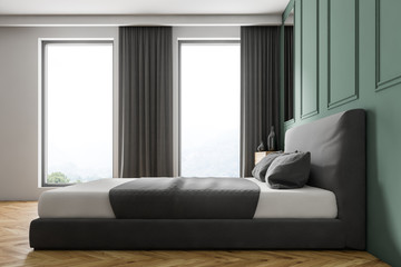 Fototapeta premium Green wall bedroom interior, side view