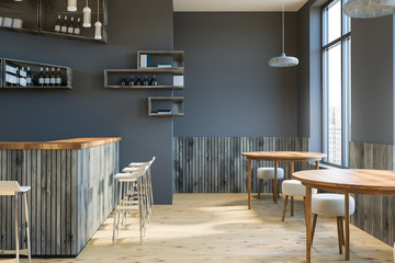 Gray bar interior, bottles on walls