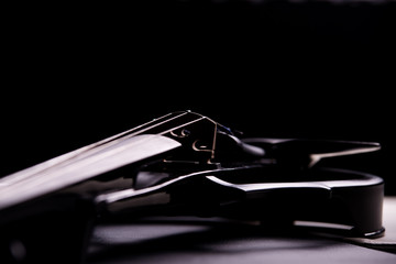 electronic violin on a black background