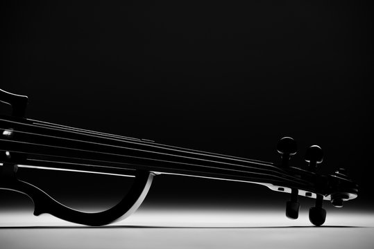 electronic violin on a black background