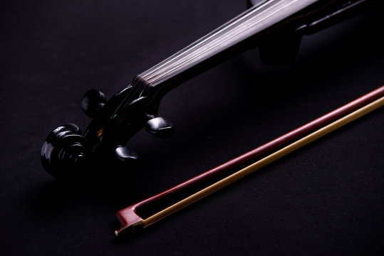 electronic violin on a black background