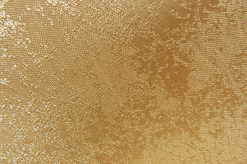 shiny fabric close-up gold canvas for decoration design textiles natural material cotton brocade...