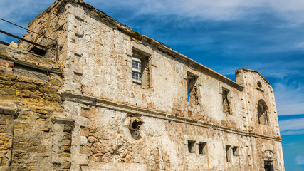 Empty windows opening in an old abandoned house