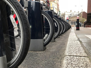 Fototapeta premium Row of rental bikes in London, UK.