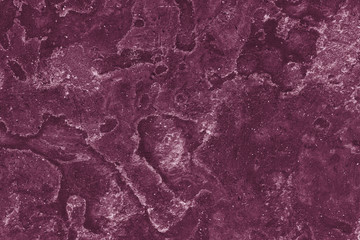 Venetian plaster wall, burgundy color. Close up.