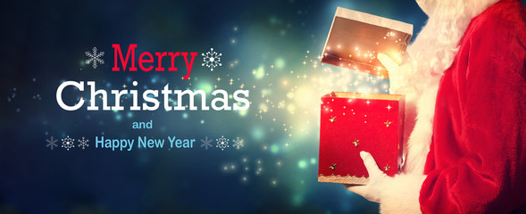 Merry Christmas and Happy New year message with Santa opening a gift box on a shiny light background
